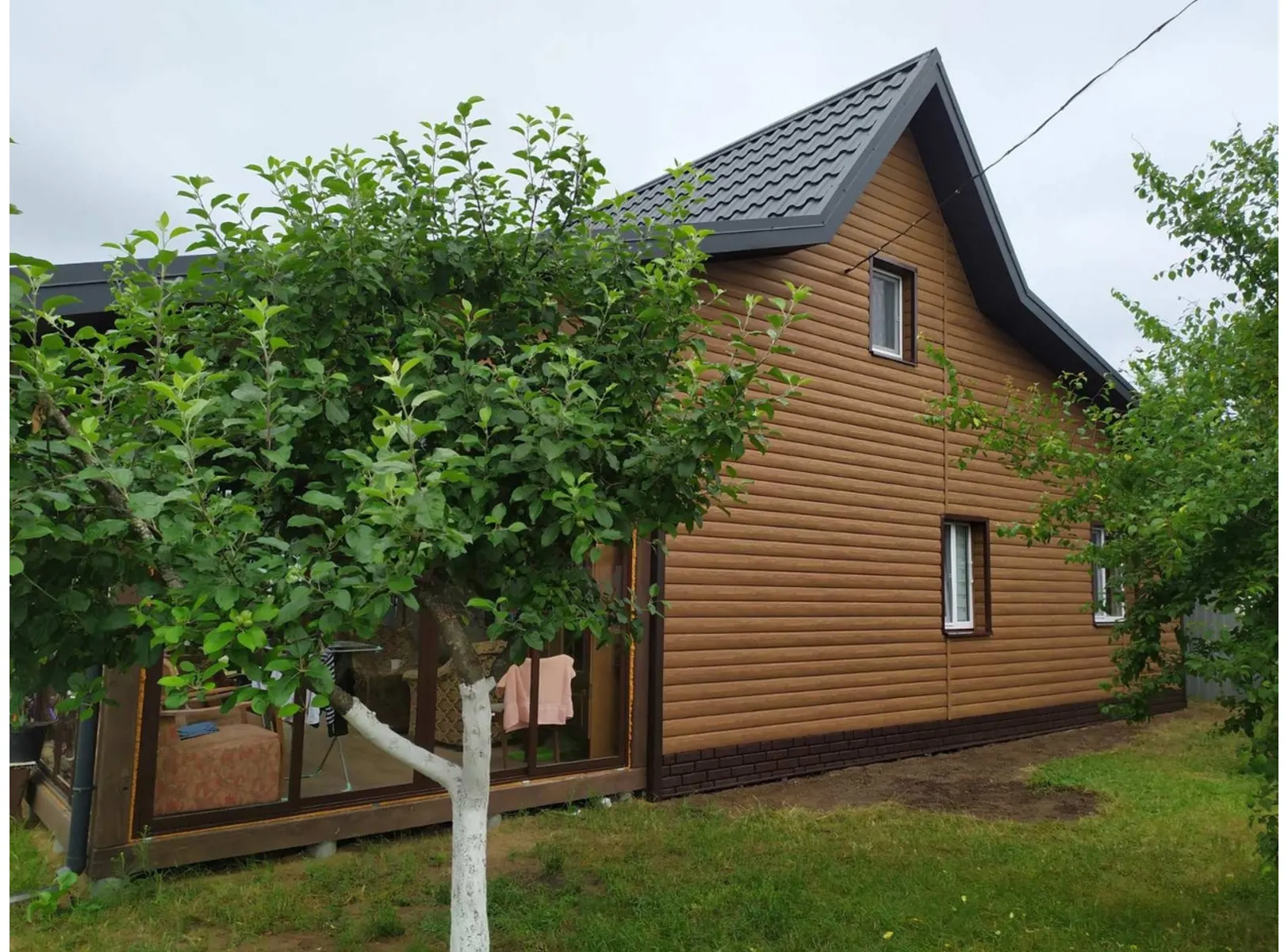 Виниловый сайдинг Docke Блок-Хаус D4.7T LUX под дерево Миндаль 3600×243